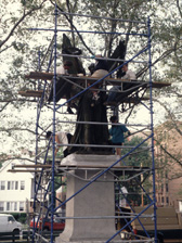 Seminar participants work from scaffold in Queens